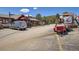 Front view of the Last Stand Tavern with parking and smoking BBQ at 33 L Rd, Golden, CO 80403