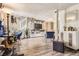 Beautiful living room with hardwood floors, entertainment center and lots of natural light at 33 L Rd, Golden, CO 80403