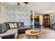 Open-concept living room is perfect for entertaining or relaxing after a long day at 33 L Rd, Golden, CO 80403