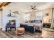 Relax in this primary bedroom featuring a ceiling fan and lots of natural light at 33 L Rd, Golden, CO 80403