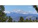 Snow-capped mountain peaks visible from this property at 33 L Rd, Golden, CO 80403