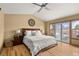 Bright primary bedroom showcasing ample natural light and stylish furnishings at 2924 E 116Th Pl, Thornton, CO 80233