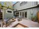 Cozy backyard patio with a fire pit and comfortable seating area at 34 Benthaven Pl, Boulder, CO 80305