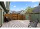 Secluded backyard patio featuring modern furniture and wooden fencing at 34 Benthaven Pl, Boulder, CO 80305