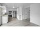 Kitchen featuring stainless steel appliances, white cabinets and modern finishes at 34 Benthaven Pl, Boulder, CO 80305