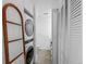 Functional laundry area with stacked washer and dryer and storage at 34 Benthaven Pl, Boulder, CO 80305