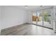 Living room featuring sliding glass doors leading to the deck and wood flooring at 34 Benthaven Pl, Boulder, CO 80305