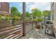 Outdoor balcony with BBQ grill and potted plants at 6946 W Alaska Dr, Lakewood, CO 80226
