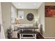 Cozy dining area features bench seating and natural light, creating a perfect spot for Gathering meals at 6946 W Alaska Dr, Lakewood, CO 80226