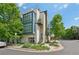Modern exterior showing landscaped front yard, large windows, and sleek architectural design at 6946 W Alaska Dr, Lakewood, CO 80226