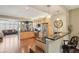 Open-concept kitchen features stainless steel appliances, granite countertops, and a breakfast bar for casual dining at 6946 W Alaska Dr, Lakewood, CO 80226
