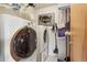 Convenient laundry room with front-loading washer and dryer at 6946 W Alaska Dr, Lakewood, CO 80226