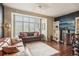 Inviting living room features hardwood floors, bright windows, and comfortable seating at 6946 W Alaska Dr, Lakewood, CO 80226