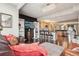 Open concept living area with kitchen, large windows and modern decor at 6946 W Alaska Dr, Lakewood, CO 80226