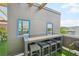 Rooftop deck features modern bar seating at 6946 W Alaska Dr, Lakewood, CO 80226