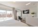 Bright bedroom with ample natural light, a modern desk and a scenic view at 15295 W 68Th Pl, Arvada, CO 80007