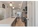 Spacious kitchen features stainless steel appliances, a center island, and sleek finishes at 15295 W 68Th Pl, Arvada, CO 80007