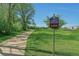 Scenic Ralston Creek Trail with lush greenery and mature trees on a clear day at 15295 W 68Th Pl, Arvada, CO 80007