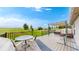 Expansive deck ideal for outdoor dining and entertaining, overlooking a spacious backyard at 7270 Marmot Ridge Pl, Littleton, CO 80125