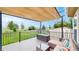 Relaxing deck with lounge furniture and a scenic view of the backyard at 7270 Marmot Ridge Pl, Littleton, CO 80125