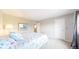 Calm and serene bedroom featuring neutral tones and soft lighting, creating a relaxing and inviting space at 7270 Marmot Ridge Pl, Littleton, CO 80125