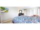 Cozy bedroom with a comfortable bed, dresser, and a TV for relaxation at 7270 Marmot Ridge Pl, Littleton, CO 80125