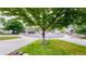 Charming cul-de-sac location with a beautiful tree in the center and well-maintained landscaping at 7270 Marmot Ridge Pl, Littleton, CO 80125