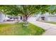Charming two-story home featuring a manicured lawn, attached garage, and inviting front porch, perfect for suburban living at 7270 Marmot Ridge Pl, Littleton, CO 80125