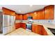 Well-lit kitchen showcasing stainless steel appliances and ample cabinet space, perfect for culinary enthusiasts at 7270 Marmot Ridge Pl, Littleton, CO 80125