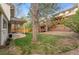 Large backyard featuring a playhouse and lawn at 8132 Lodgepole Trl, Lone Tree, CO 80124