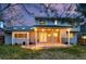 Cozy backyard featuring a covered patio with string lights, perfect for outdoor relaxation at 8132 Lodgepole Trl, Lone Tree, CO 80124