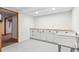 Basement with white cabinets and a sink at 8132 Lodgepole Trl, Lone Tree, CO 80124