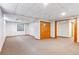 Spacious basement with carpet and a tile ceiling at 8132 Lodgepole Trl, Lone Tree, CO 80124