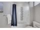 Bathroom with a tub and shower, and a modern design at 6025 Ames St # A, Arvada, CO 80003