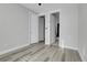 Bedroom with access to a bathroom and another room at 6025 Ames St # A, Arvada, CO 80003
