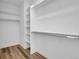 Large walk-in closet with ample shelving and hanging space at 6025 Ames St # A, Arvada, CO 80003
