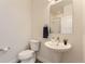 Bright bathroom with white pedestal sink, toilet, and glass shower at 4100 E Iliff Ave # 4, Denver, CO 80222