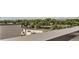 City views from the rooftop deck offering expansive rooftop views of trees and commercial buildings at 4100 E Iliff Ave # 4, Denver, CO 80222