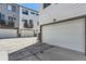 Modern townhome featuring a convenient attached two-car garage with a private balcony at 4100 E Iliff Ave # 4, Denver, CO 80222