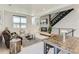 Cozy living room with a fireplace, comfortable seating, and modern decor at 4100 E Iliff Ave # 4, Denver, CO 80222
