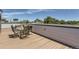 Outdoor dining on rooftop patio with scenic views and plenty of sunlight at 4100 E Iliff Ave # 4, Denver, CO 80222