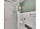 Cozy bathroom with a glass door shower and white tiling at 461 Nome St, Aurora, CO 80010