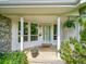 Inviting front porch with decorative columns and large windows, adding to the home's curb appeal at 461 Nome St, Aurora, CO 80010