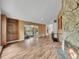 Spacious living room featuring built-in cabinets and stone fireplace at 461 Nome St, Aurora, CO 80010