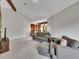 Open-concept living room with comfortable seating, and large windows, perfect for relaxing or entertaining guests at 461 Nome St, Aurora, CO 80010
