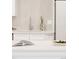 Close-up of a modern kitchen showcasing elegant countertops, stylish faucet, and contemporary design at 2257 S Lowell Blvd, Denver, CO 80219