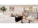 Comfortable living area with stylish furnishings, a decorative tree, and a warm, inviting atmosphere at 2257 S Lowell Blvd, Denver, CO 80219