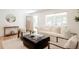 Charming living room with stylish furnishings, neutral tones, and a welcoming ambiance at 2257 S Lowell Blvd, Denver, CO 80219