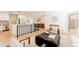 Inviting living room with hardwood floors, neutral decor, and ample natural light at 2257 S Lowell Blvd, Denver, CO 80219
