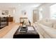 Cozy living room with comfortable seating, modern decor, and warm natural light at 2257 S Lowell Blvd, Denver, CO 80219